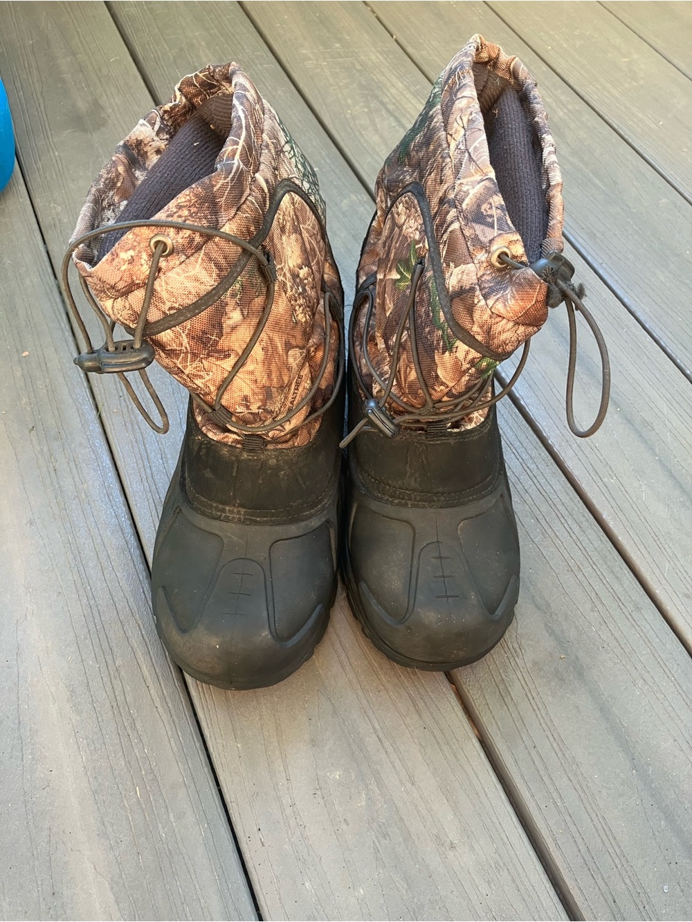 Kids Waterproof Winter Boots in Camouflage Brown. Some wear.